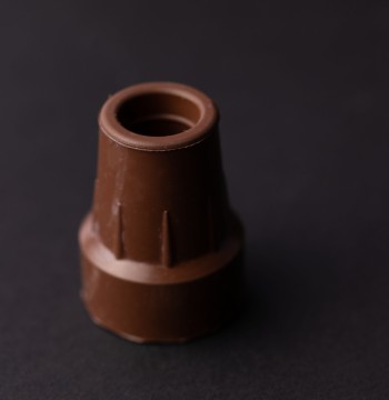 رأس العكاز الطبية باللون البني